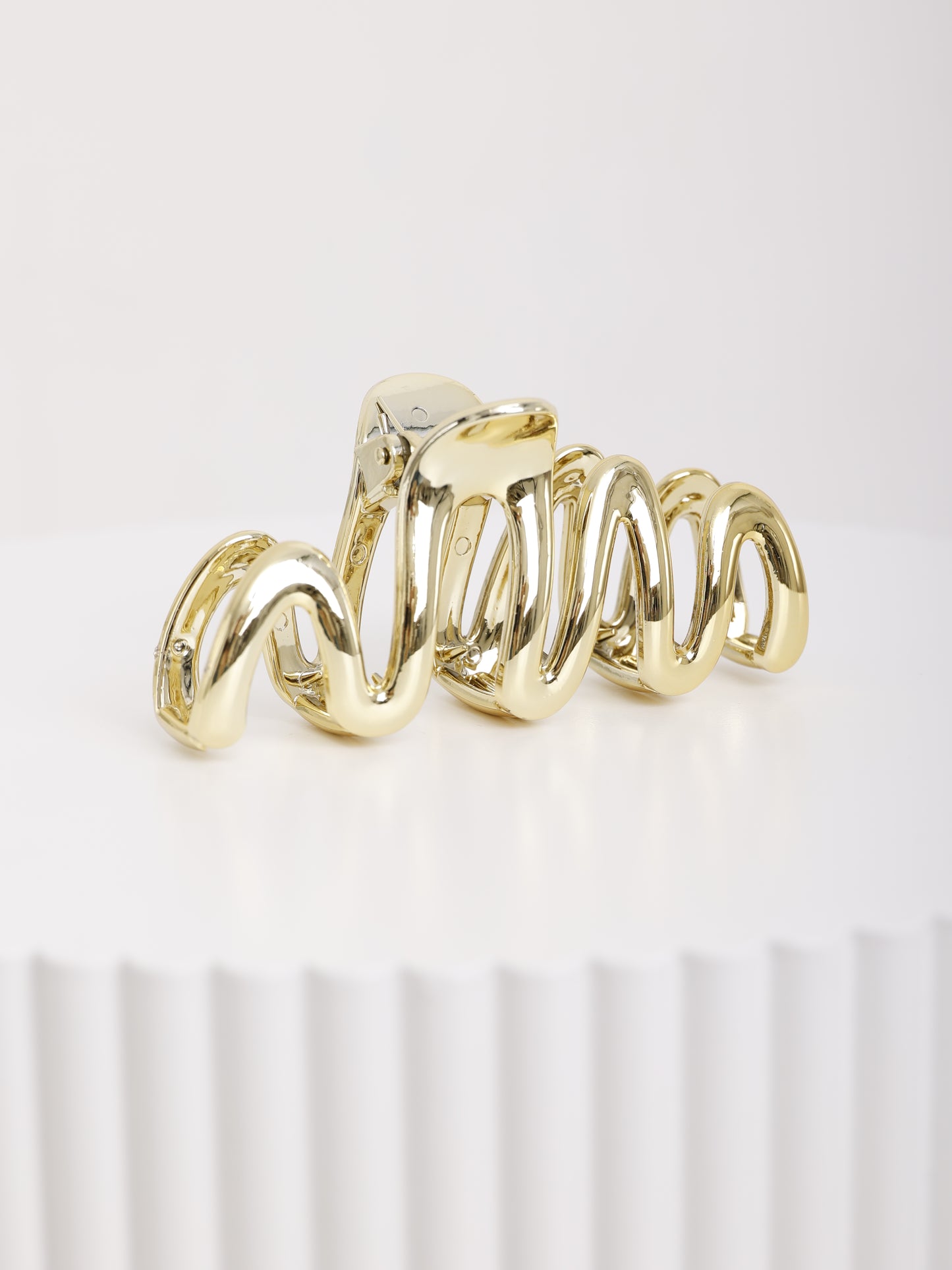 Wave Clip – goldene Haarklammer