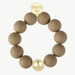 Big Pearly – Mattes Armband mit goldener Kugel