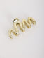 Wave Clip – goldene Haarklammer